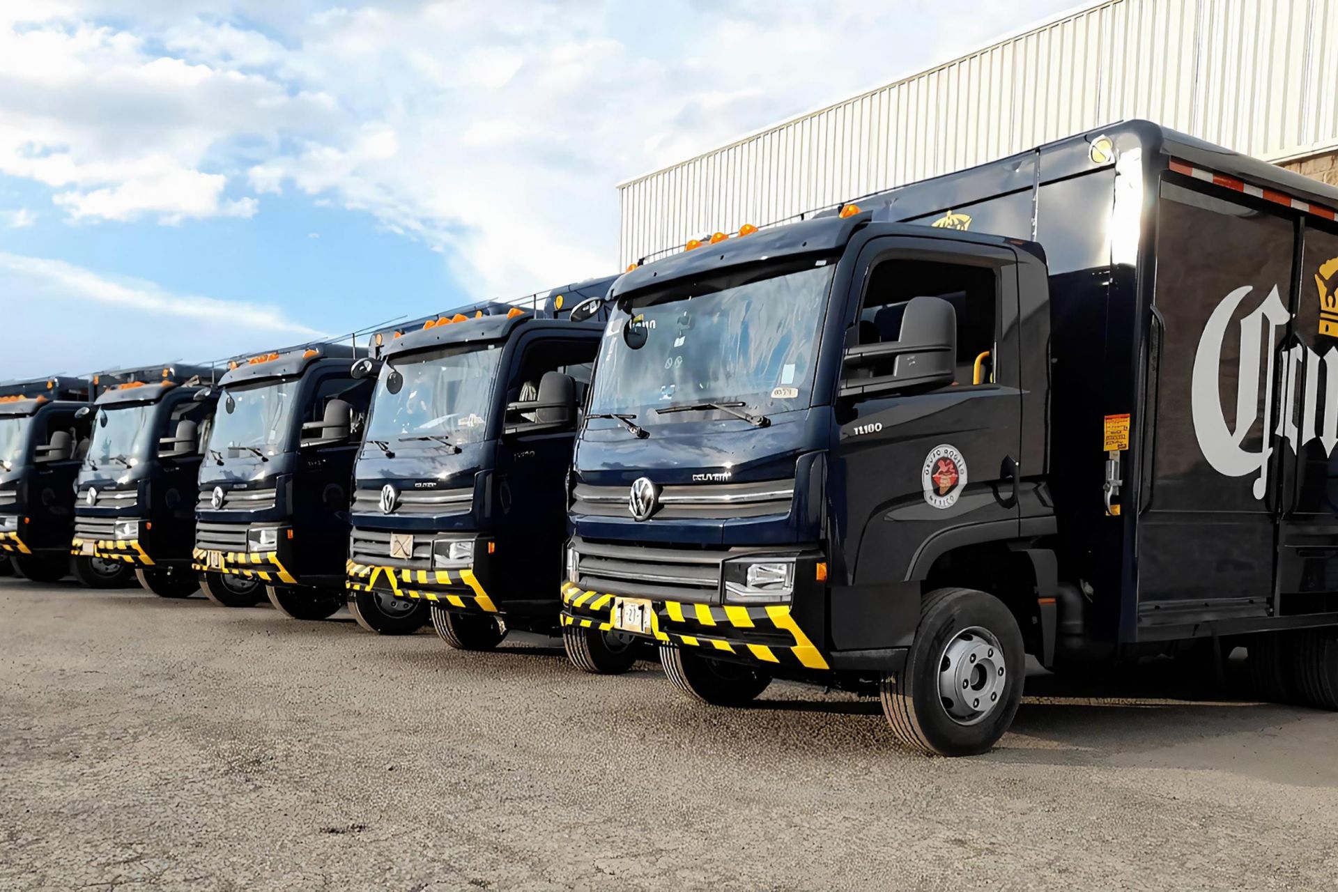 Image of several VWCO trucks in one row
